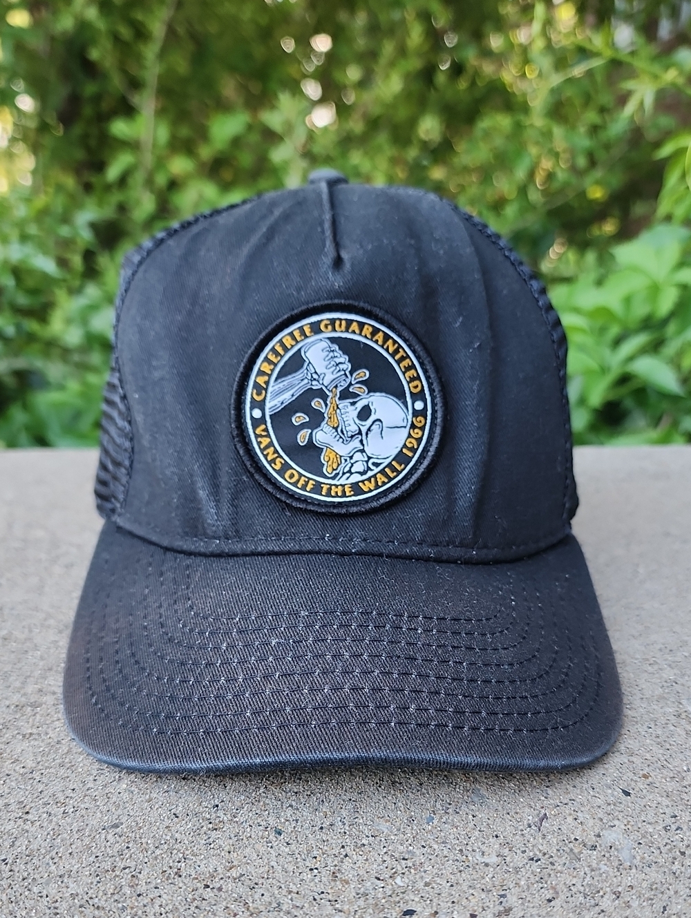 Vans Black Trucker Hat with Round Skull Patch